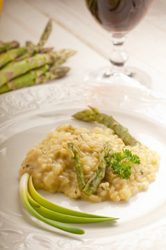 asparagus rice over dish and red wine