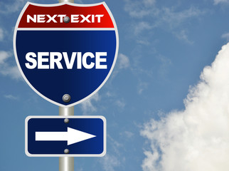 Service road sign with blue sky