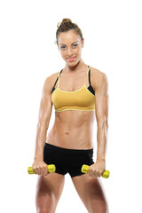 Young attractive woman with weights isolated on white background