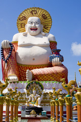 Smiling Buddha of wealth statue on Koh Samui, Thailand