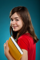 Girl holding book