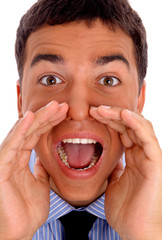 Closeup portrait of a young man screaming out loud