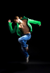 Fototapeta na wymiar stylish and young modern style dancer is posing