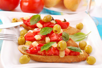 bruschetta on white plate