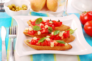 bruschetta on white plate