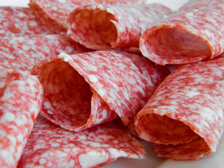 Closeup of salami sliced.