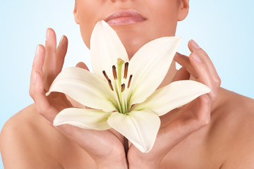 spa woman holding flower