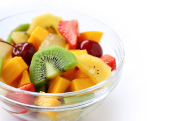 Fresh fruits salad on white background