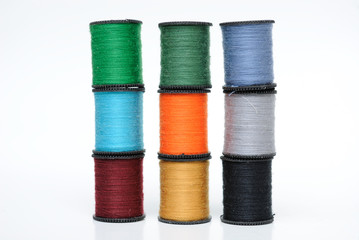 Colorful Spools of Thread Stacked