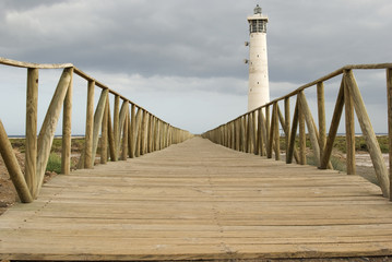 Lighthouse with  wooden footbridge. Fuerteventura