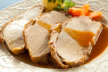 Roasted loin slices with vegetables