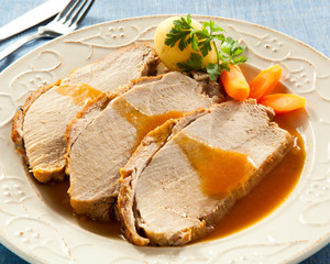 Roasted loin slices with vegetables