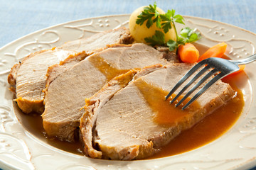 Roasted loin slices with vegetables