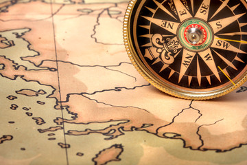 Obraz na płótnie Canvas Compass on old map