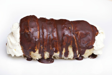 Roll with whipped cream and chocolate