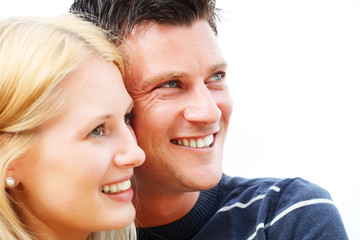 Close-up portrait of a young happy couple. Shallow DoF.