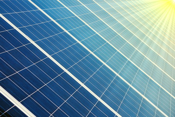 Obraz premium Photovoltaic cells and sun