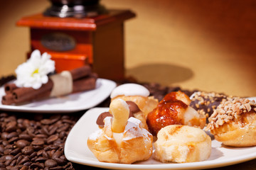 Spanish traditional desserts plate on coffe beans pile
