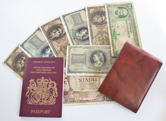 foreign currency, passport and wallet