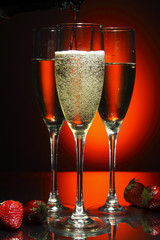 Champagne poured in to the glass