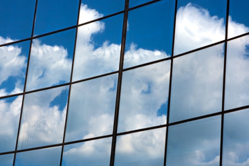 reflection of blue sky and clouds