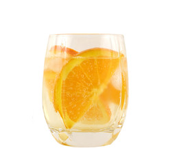 glass of sparkling water with orange slices