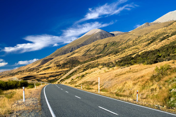 mountain road on clear sunny day of autumn