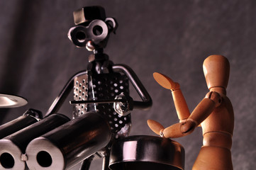 Two drummer figures playing percussion