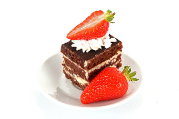 chocolate  cake with cream and  strawberry on white