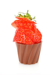 chocolate  cake with cream and  strawberry on white