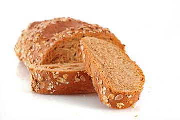 Bread with sunflower seeds isolated on white