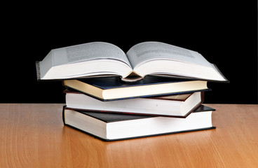 Pile of books isolated on background