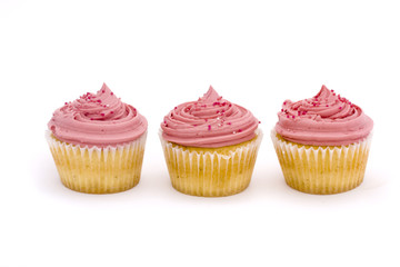 three pink cupcakes