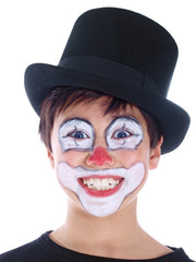 smiling boy with painted face isolated on white background