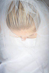 Bride woman in wedding dress in studio