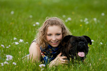Young girl lay in the grass