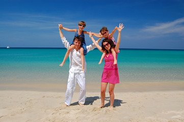 Happy family on beach vacation