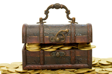 Wooden casket full of coins isolated on white