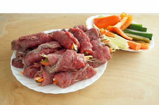 rolling slices of beef for collops