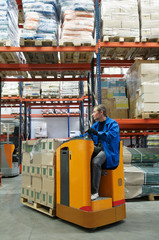 order picker loader in warehouse