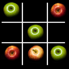 Tic Tac Toe game with green and red apples