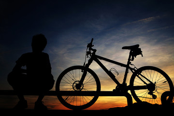 Obraz premium young asian man with bike