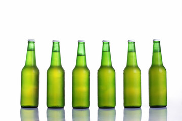 Beer in bottle on a white background .