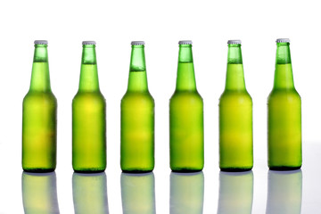 Beer in bottle on a white background .
