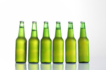 Beer in bottle on a white background .