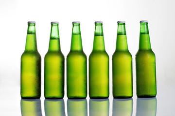 Beer in bottle on a white background .