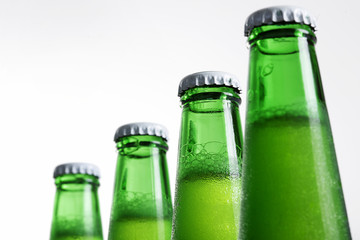 Beer in bottle on a white background .