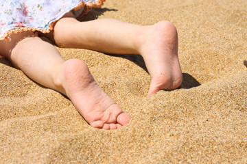 Child Feet on sand