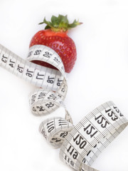 strawberry and the measuring tape