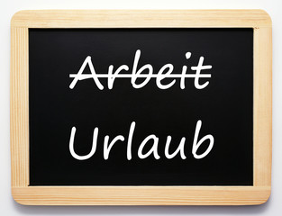 Obraz premium Ende Arbeit / Beginn Urlaub - Konzept Schild